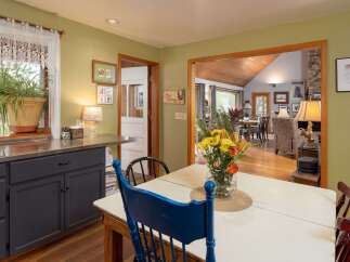 Step into this charming home and discover a cozy dining area, perfect for family gatherings.