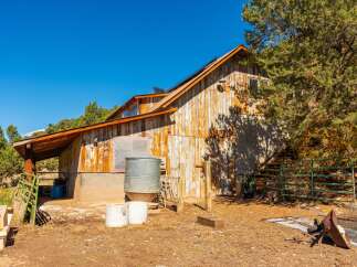 Rustic charm meets modern functionality in this unique property.