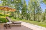 Enjoy the serene mountain lifestyle with this inviting outdoor patio space, perfect for relaxation and entertaining.