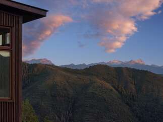 Experience breathtaking mountain views from this stunning property.