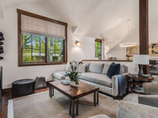 This stunning living room boasts a modern design with a cozy atmosphere.