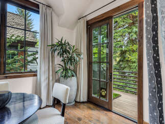 Step into a world of natural beauty with this stunning property, featuring a seamless blend of indoor and outdoor living.