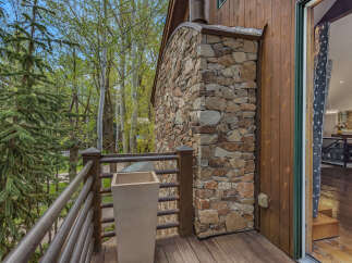 Enjoy the tranquility of nature from this stunning balcony.