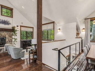 This stunning property boasts a warm and inviting living space, perfect for entertaining or relaxing.