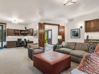 This stunning property boasts a spacious living area, perfect for entertaining or relaxing.