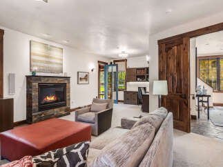 Step into luxury with this stunning property featuring a cozy fireplace, perfect for those chilly evenings.