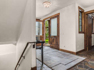 Step into luxury with this stunning entryway, showcasing exquisite craftsmanship and attention to detail.