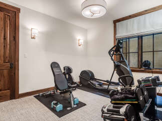 This home gym offers a dedicated space for fitness enthusiasts.