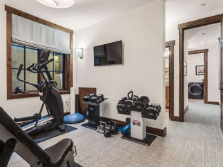 This home gym offers a dedicated space for fitness enthusiasts.