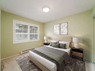 Step into a serene bedroom retreat, bathed in natural light and designed for ultimate relaxation.