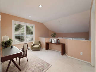 Discover the charm of this inviting loft space, perfect for a home office or creative retreat.