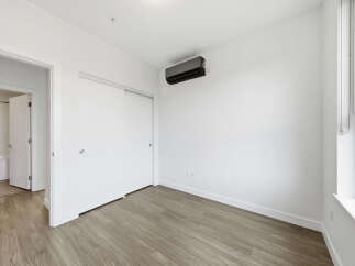 This bright and airy room features a modern design with clean lines and neutral tones.