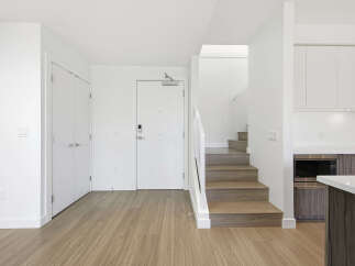 Step into modern elegance with this stunning property featuring a bright and airy interior.