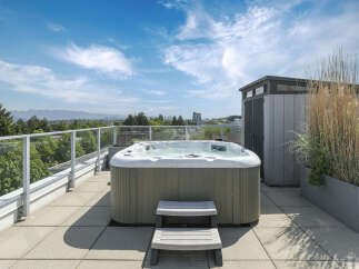 Enjoy luxurious outdoor living with this stunning rooftop hot tub.
