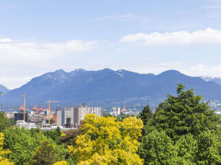 Enjoy breathtaking views of the mountains and city skyline from this stunning property.