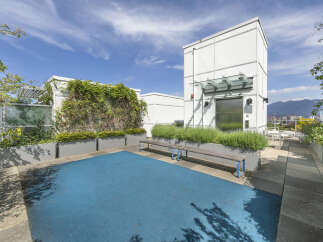 Discover urban living at its finest with this stunning rooftop oasis.