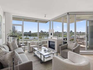 Experience luxury living in this stunning condo with breathtaking city and water views.