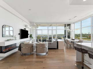 Experience luxury living in this stunning modern condo with breathtaking views.