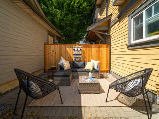 Enjoy outdoor living at its finest with this beautifully designed patio space.