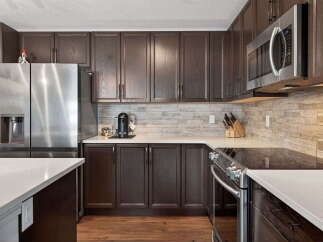 This stunning kitchen boasts modern design and functionality.