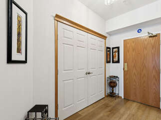 Step into this inviting entryway, showcasing a blend of style and functionality.