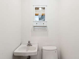 This bathroom features a clean and modern design, perfect for any home.