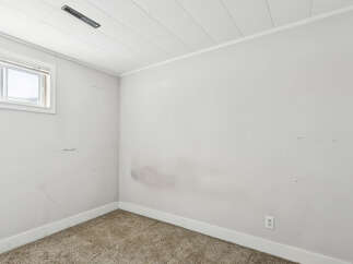 Discover the potential of this blank canvas! This room features a neutral color palette, offering a versatile space ready for your personal touch.