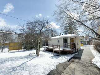 This charming property features a cozy deck perfect for enjoying the outdoors.