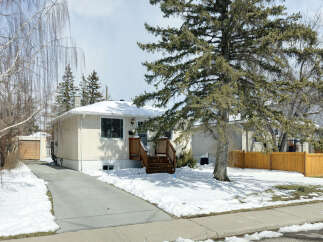 This charming home offers a cozy retreat with its inviting facade and well-maintained exterior.