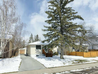 This charming home offers a cozy retreat with its inviting facade and well-maintained exterior.