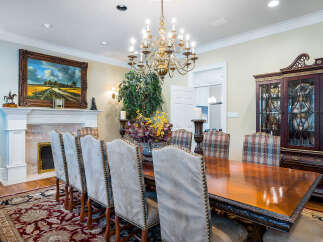 Step into luxury with this elegant dining room, perfect for hosting memorable gatherings.