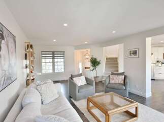 Step into this inviting living space, perfect for relaxation and entertaining.