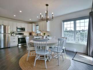 Step into this bright and airy kitchen and dining area, perfect for entertaining or everyday living.