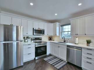 This stunning kitchen boasts modern design and functionality.