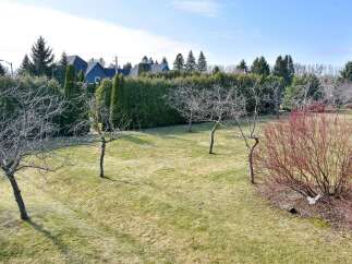This property boasts a beautifully landscaped yard, perfect for outdoor enjoyment.