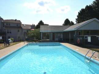 Enjoy the refreshing waters of this community pool, perfect for relaxation and recreation.