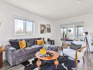 Step into this inviting living space, perfect for relaxation and entertaining.