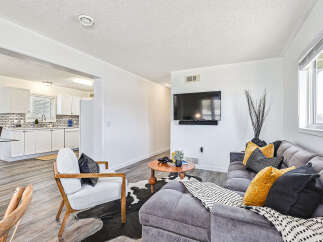 Step into this inviting living space, perfect for relaxation and entertaining.