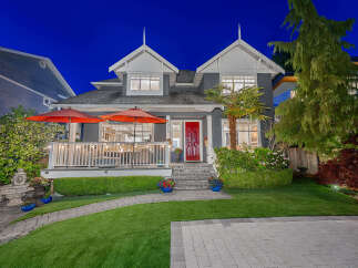 Discover the charm of this stunning property, featuring a beautifully landscaped yard and a welcoming front porch.
