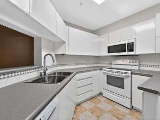 This stunning kitchen boasts modern design and functionality.