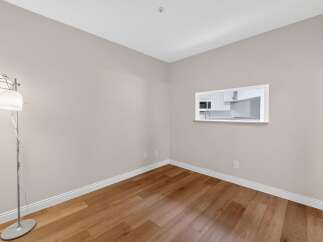 This inviting space features beautiful hardwood floors and neutral walls, creating a versatile canvas for your personal style.