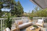 Enjoy the outdoors from this charming balcony, perfect for relaxing or entertaining.