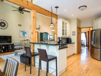 Step into this stunning kitchen, boasting a spacious layout and elegant design.