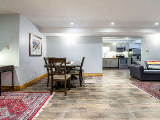 This stunning property boasts a spacious open-concept living area, perfect for entertaining.