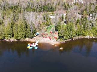 Discover a serene lakeside retreat with this stunning property.