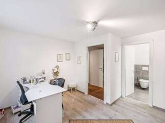 Discover this bright and airy space, perfect for a home office or creative studio.