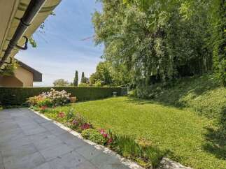 Discover the tranquility of this stunning property, featuring a lush, expansive backyard perfect for relaxation and entertaining.