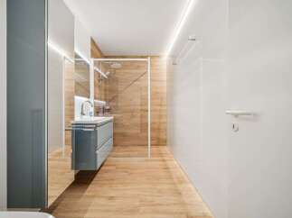 Step into modern luxury with this stunning bathroom.