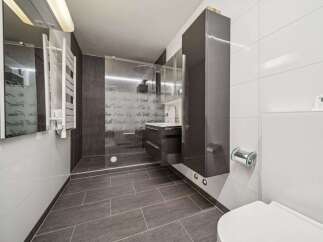 Step into modern luxury with this stunning bathroom.