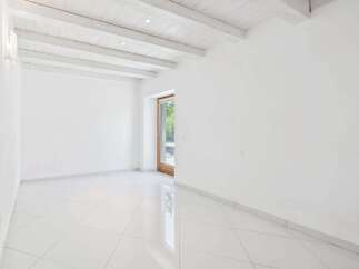 Discover the epitome of modern elegance in this pristine, all-white interior.